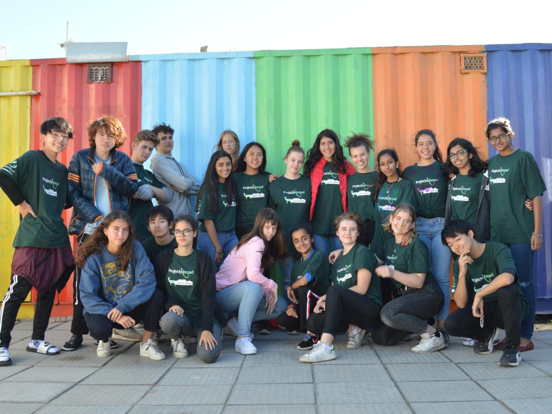 Young students work together on a High School Special with Projects Abroad in South Africa. A group of high school students volunteer abroad together in South Africa.
